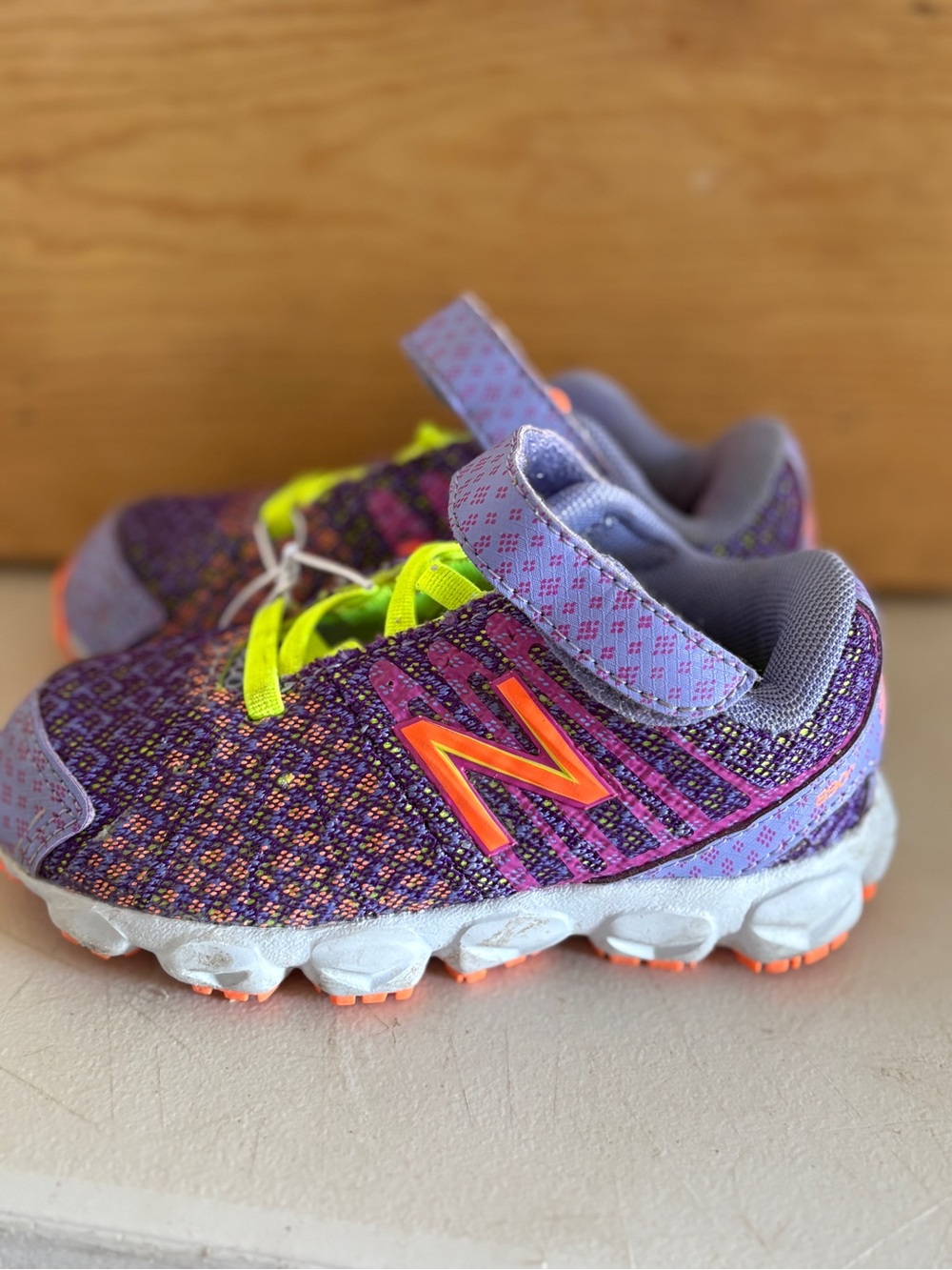 New Balance Kids Purple with Neon Orange & Yellow Accent Sneakers